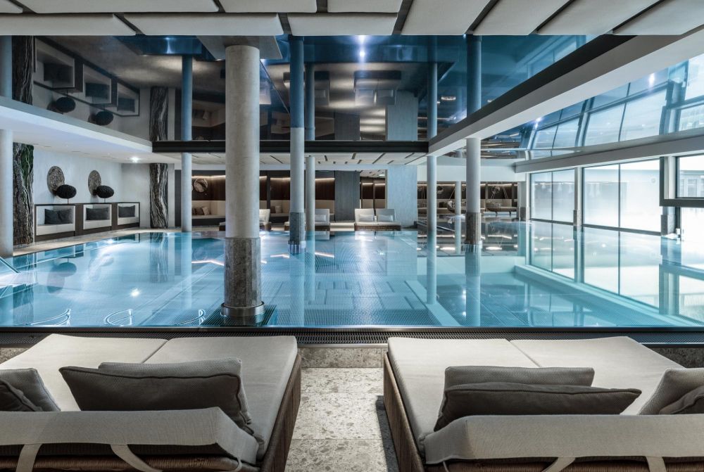 View from comfortable seating at the edge of an indoor pool.