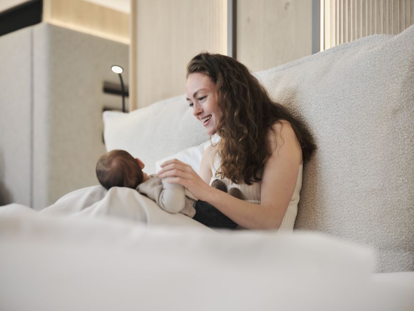 Mum and baby in a family bed Mum and baby in a family bed