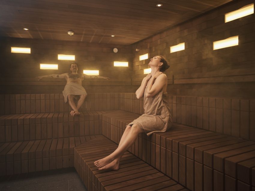 Two adults an a sauna Two adults an a sauna
